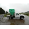 1730 Ltr Side Discharge Bin hooked onto a flat tray ute