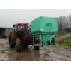 1730 Ltr Side Discharge Bin being moved by a tractor