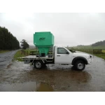 1730 Ltr Side Discharge Bin hooked onto a flat tray ute