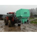 1730 Ltr Side Discharge Bin being moved by a tractor